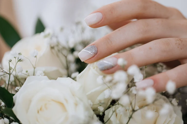 bride-demonstrates-her-manicure-wedding-bouquet